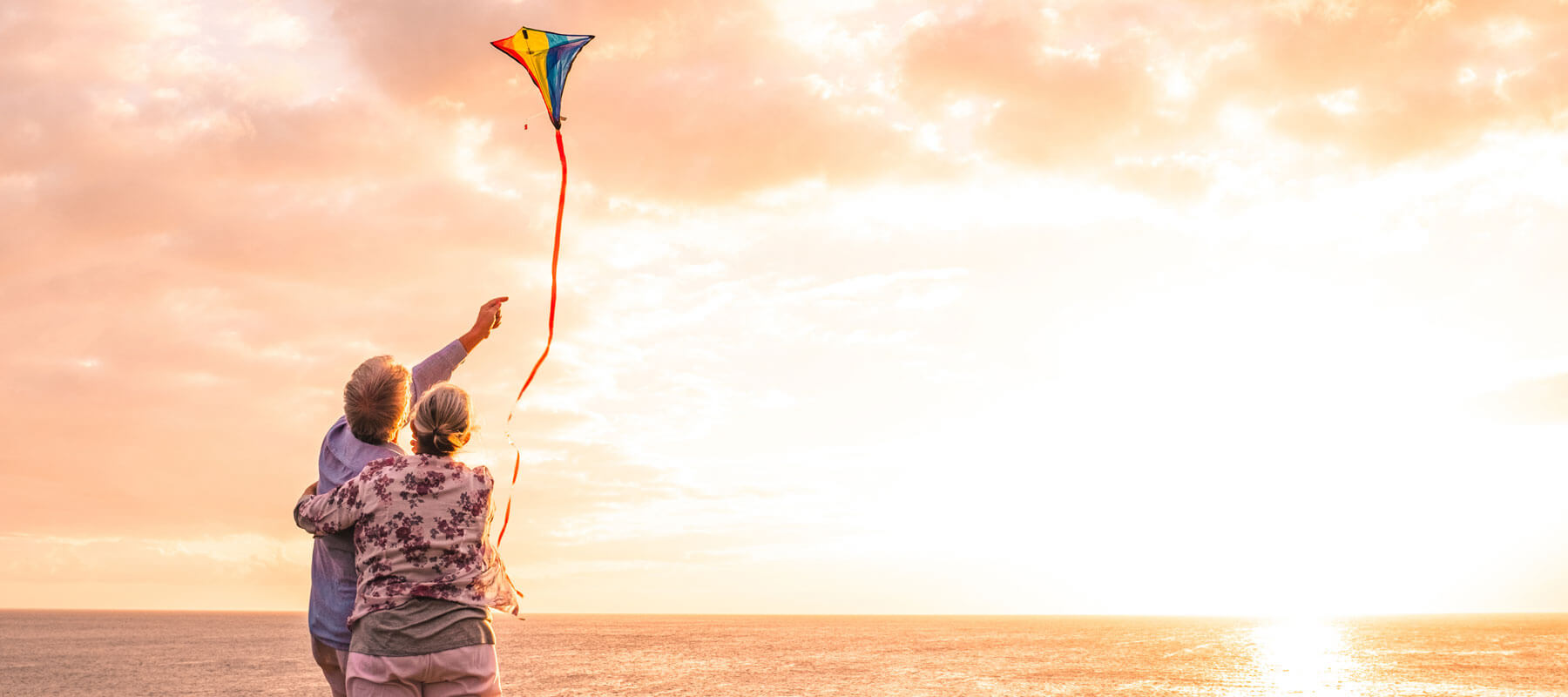 Elderly Couple Flying Kite